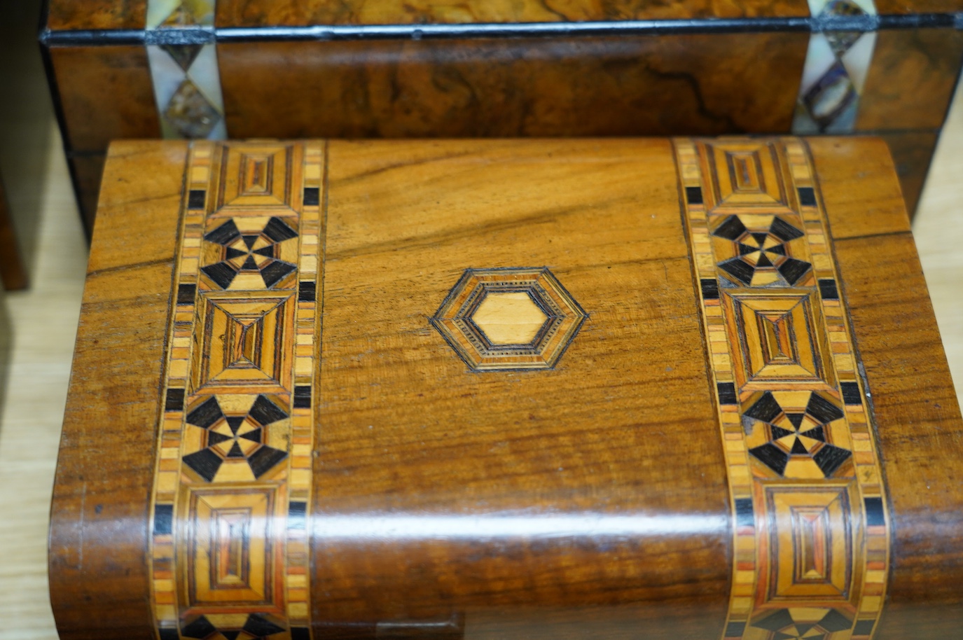 A rosewood military box, a mother-of-pearl inlaid box, another similar box, an inlaid box and plainer box (5). Condition - fair to good